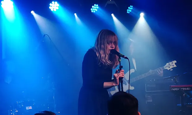 Alexandra Saviour "theatrically cowering down behind the mic. Photograph: Casey Cooper-Fiske