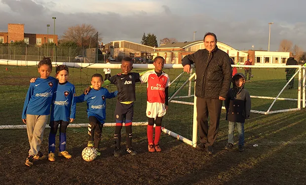 Amir Atefi with members of the U8s team who received the free McDonald's kit