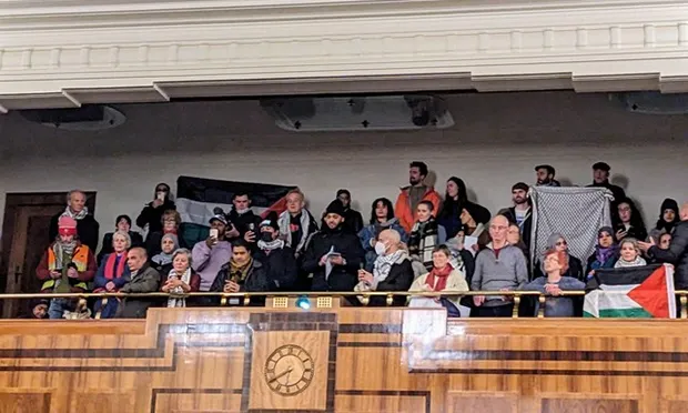 Hackney Palestine Solidarity Campaign pensions protest in public gallery of Hackney Town Hall chamber, 29 November 2023
