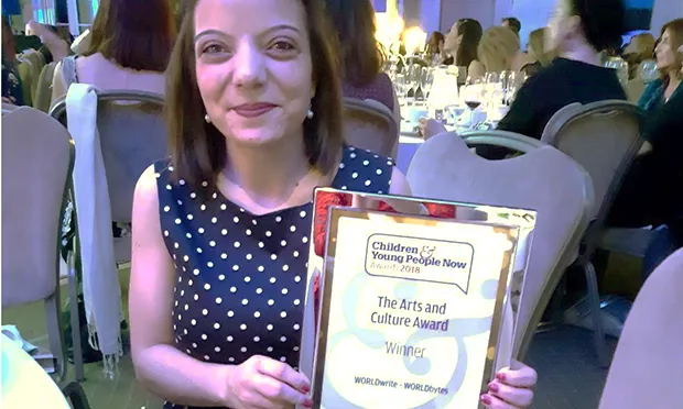 Marisa Pereira, assistant director of WORLDwrite with their CYPN Arts and Culture award