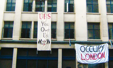 Occupy London protesters take over empty UBS bank offices