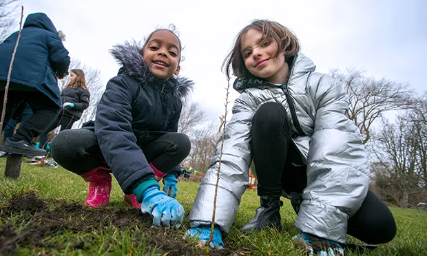 ‘Greening the grey’: Clapton pupils help plant 780 trees on former industrial land at Millfields Park