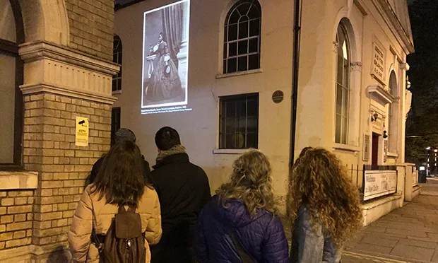 Portraits of black Victorian women projected onto side of Newington Green church