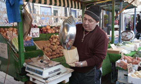Greengrocer on his stall, Broadway Market Photo: Â© The Hackney Citizen Ltd