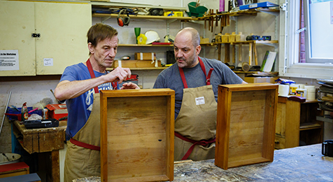 Two volunteers at Restoration Station in Shoreditch. Photograph: Spitalfields Crypt Trust 