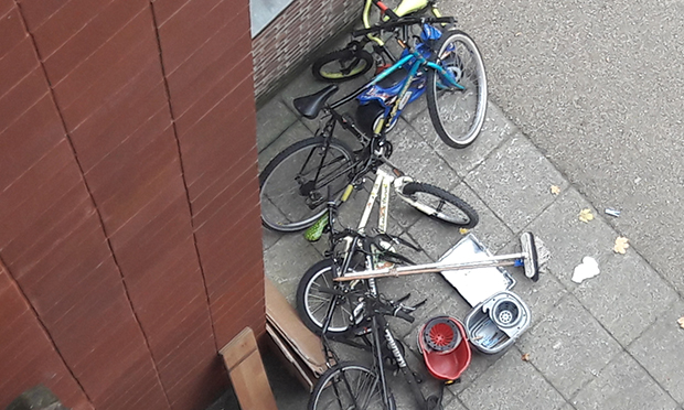 A resident's photograph showing some of the items removed from the hallways on the estate and deposited on the pavement, where they were left unsupervised and vulnerable to thieves