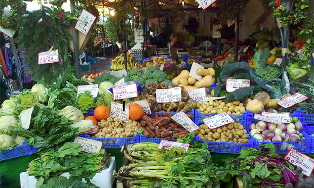 A typical greengrocer's table, resplendent with cabbage and spinach. Photograph: Sean Hickin via Flickr