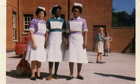An archival photograph showing three carribean nurses 