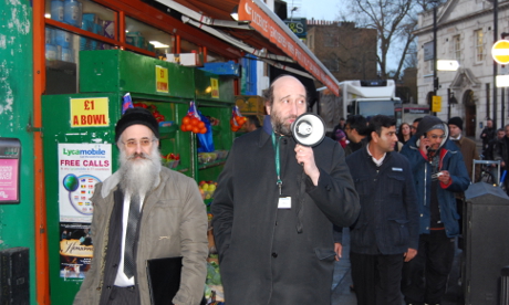 Councillor Simche Steinberger leads protestors to the Town Hall
