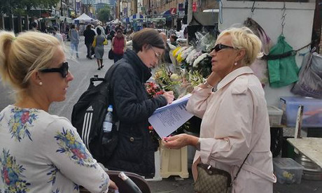 Collecting signatures at Hoxton Market