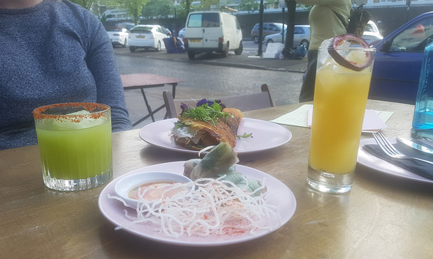 Summer rolls (foreground), jian bing (background) and cocktails al fresco at Pamela