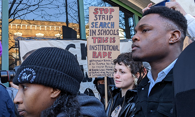 Protestors listen to the speeches
