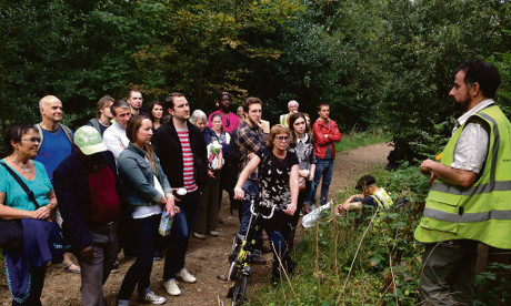 Ecologist Russell Miller leads a walk through Abney Park last month to raise awareness about the supermarket 'threat'. Photograph: Stokey Local